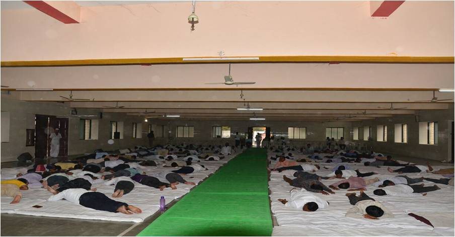Participants resting during a meditative program