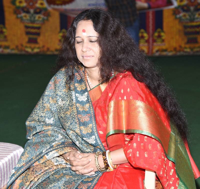 Sadhana Yogalakshmi seated in meditation