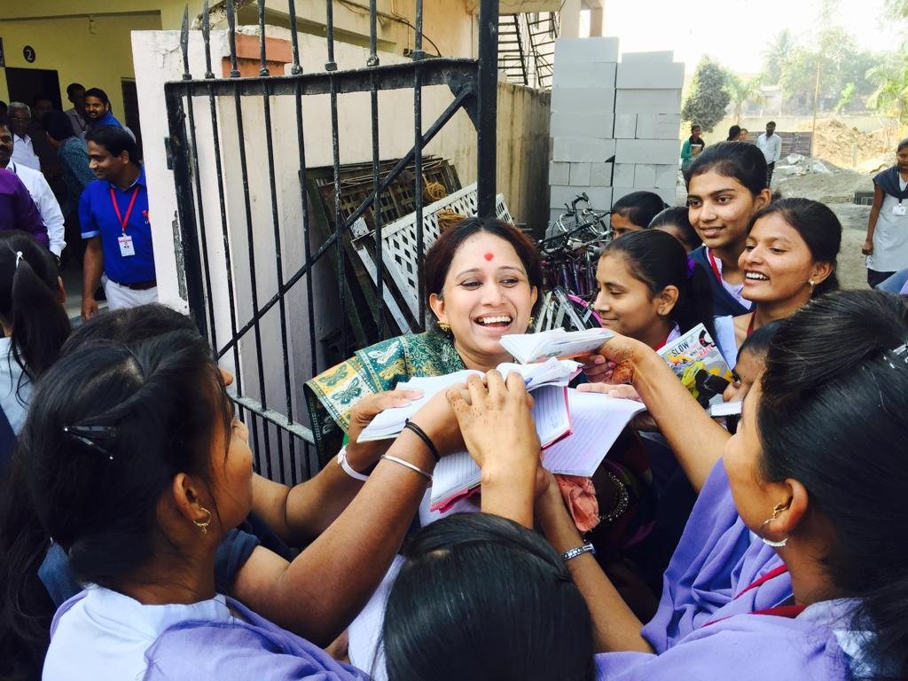 Sadhana Yogalakshmi with students during a program